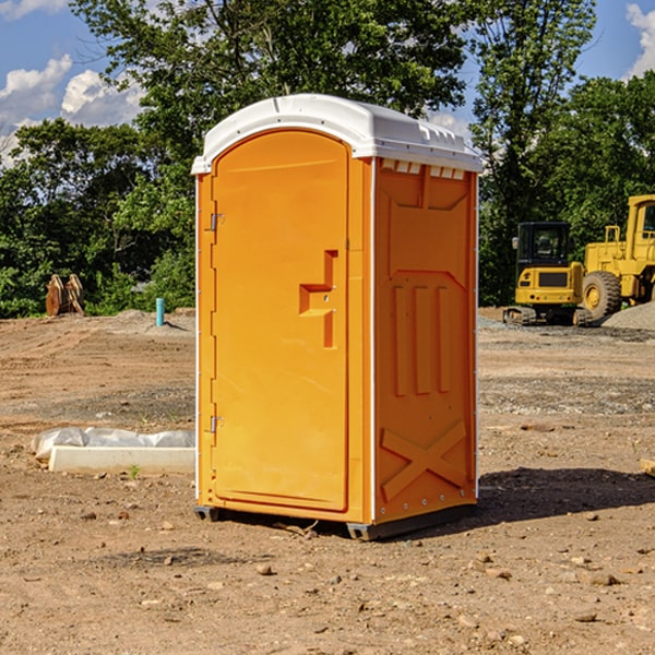 how often are the portable restrooms cleaned and serviced during a rental period in Charleston MS